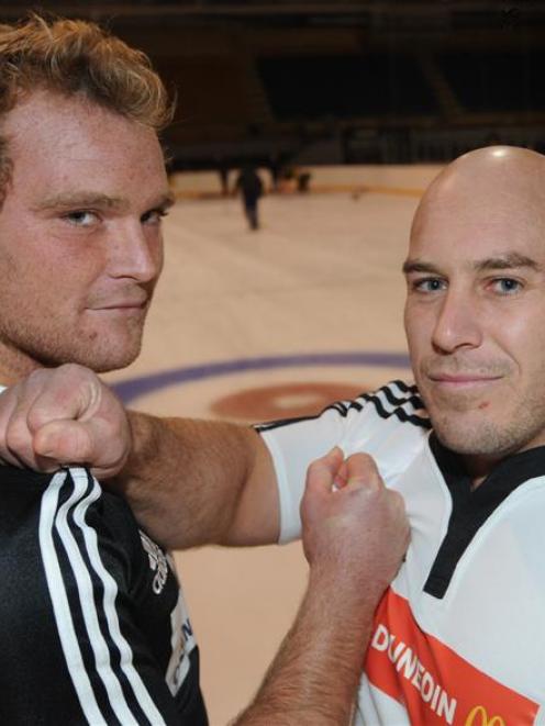 North captain Luke Braid (left) and South captain Jason Rutledge prepare to do battle on Sunday....