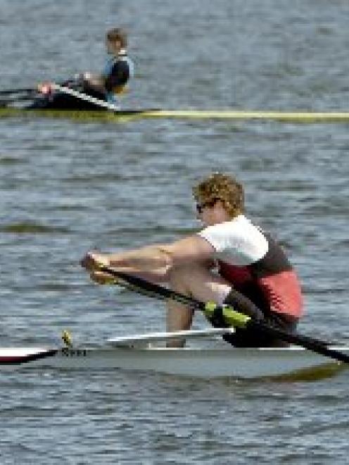 North End's Michael Nisbet (nearest camera) wins the men's open single sculls from Fergus Fauvel ...
