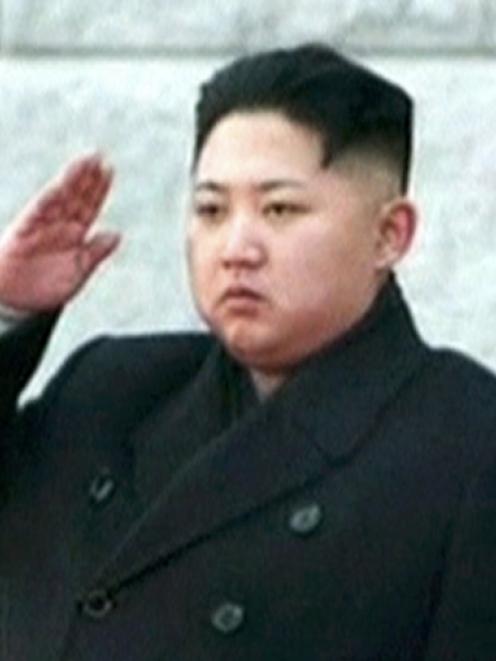 North Korea's new leader, Kim Jong Un, salutes during the funeral of late leader Kim Jong Il in...