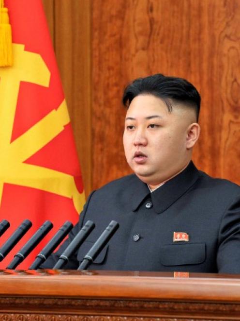 North Korean leader Kim Jong-un delivers a New Year address in Pyongyang in this picture released...