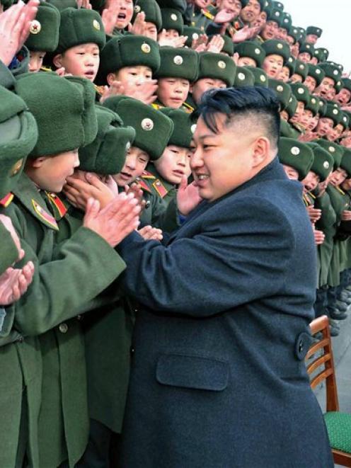North Korean leader Kim Jong Un greets students at Mangyongdae Revolutionary School in Pyongyang,...
