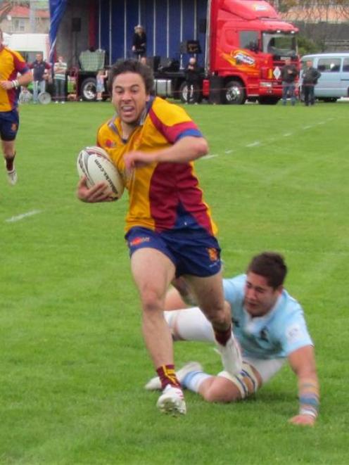 North Otago right wing Whiria Meltzer on his way to the line against East Coast during Saturday's...