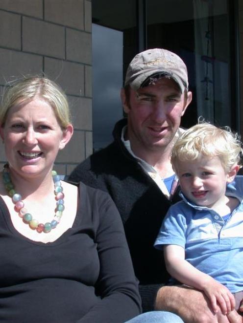 North Otago rugby stalwart Ross Hay relaxes with his family, son Charlie (17 months) and wife Jo,...