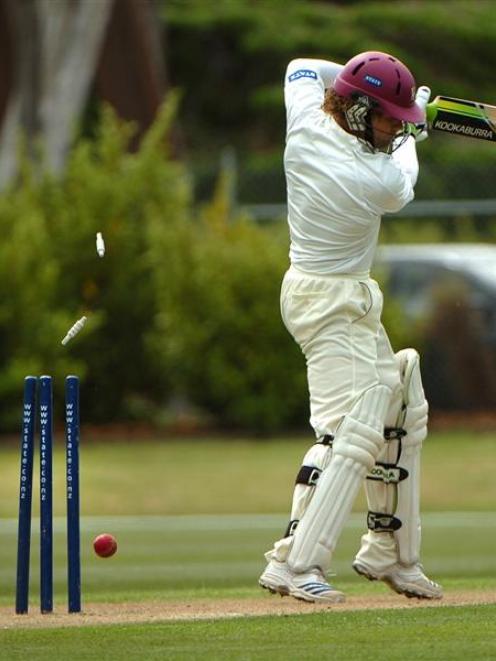 Northern Districts batsman James Marshall is bowled by Otago's Ian Butler during the State...