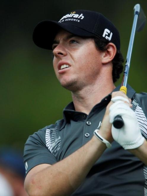 Northern Ireland's Rory McIlroy tees off at the third hole during the second round of the...