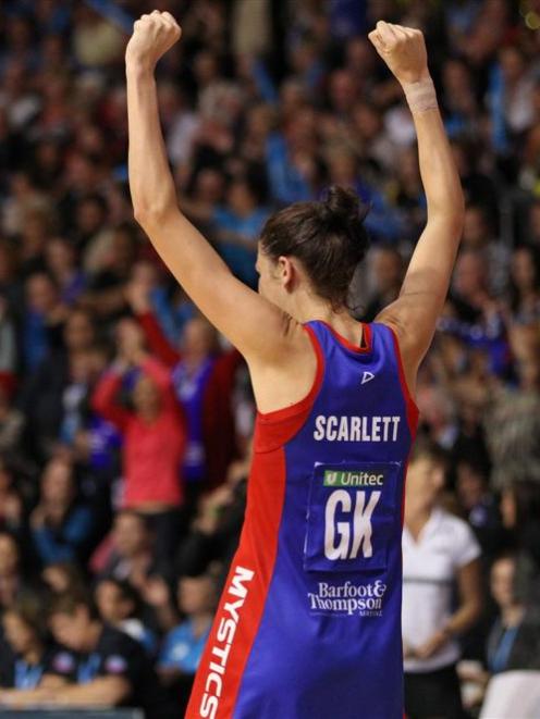 Northern Mystics goal keep Anna Scarlett raises her arms in jubilation after her team beat the...