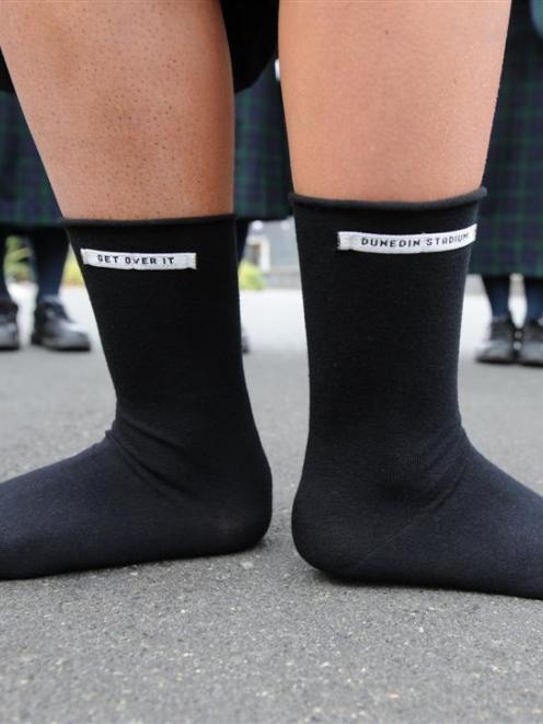 Columba College's Young Enterprise group will be selling socks with a message at tonight's rugby...