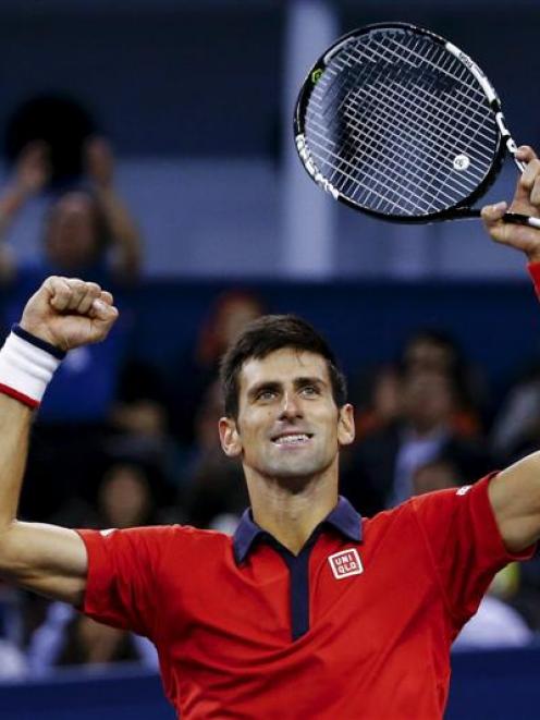 Novak Djokovic celebrates after beating Jo-Wilfried Tsonga to win the Shanghai Masters. Photo:...