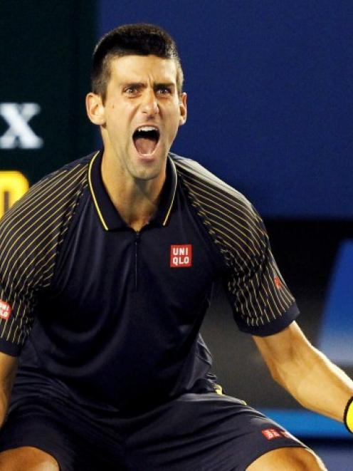 Novak Djokovic of Serbia celebrates defeating Andy Murray of Britain in their men's singles final...
