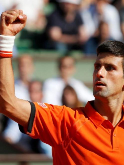 Novak Djokovic was too good for Rafael Nadal in their French Open quarterfinal. REUTERS/Jean-Paul...