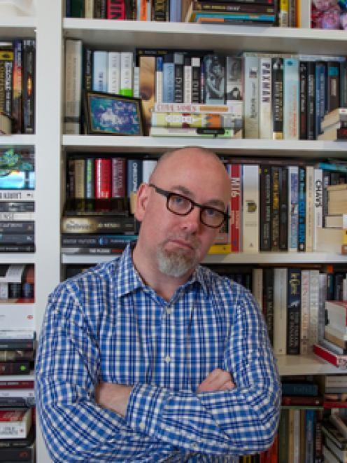 Novelist and screenwriter Neil Cross at his Wellington home. Photo by NZ Herald