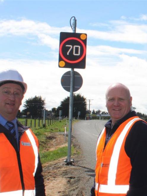 NZ Transport Agency senior network manager Peter Robinson  (left) and Armitage Group installation...