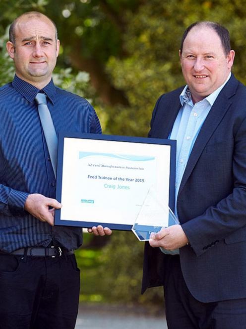 NZFMA feed industry trainee of the year Craig Jones, of Gore, (left) with association chairman...
