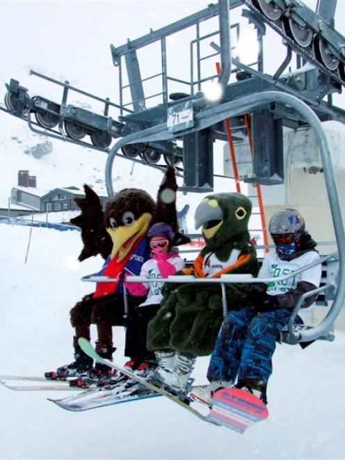 NZSki mascots Spike and Shred share the first chair on Alta lift for the 2013 season with...