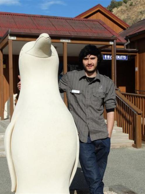 Oamaru Blue Penguin Colony employee Tiare Barlow stands outside the colony's main building, which...