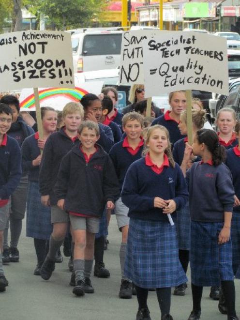 Oamaru Intermediate School pupils march to show they care about  teaching staff cuts. Photo by...