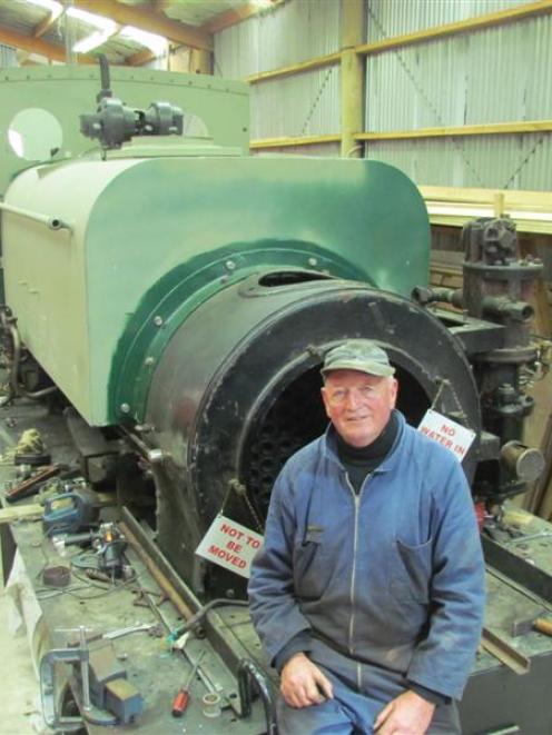 Oamaru Steam and Rail Society volunteer Frank Thomas takes a break from helping restore a 1924...