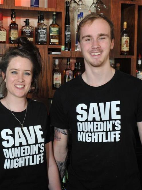 Octagon bar Ratbags staff Laura Dowling (22) and Jared Hewitt (20) wear ''Save Dunedin's...