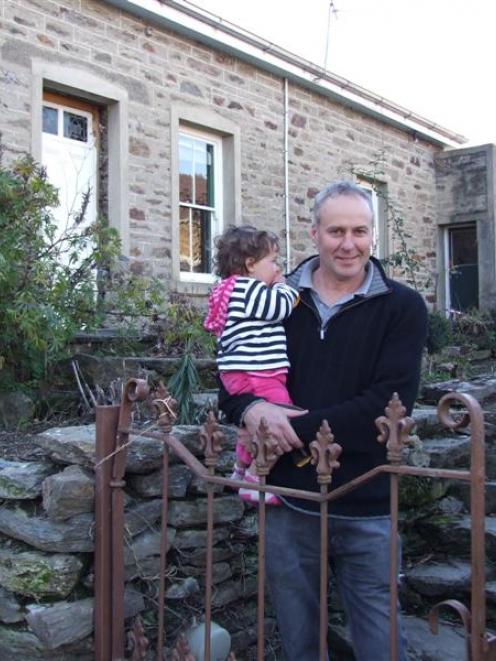 Olivers owner Doug Bickley and daughter Janie (21 months) in the grounds of the historic Clyde...