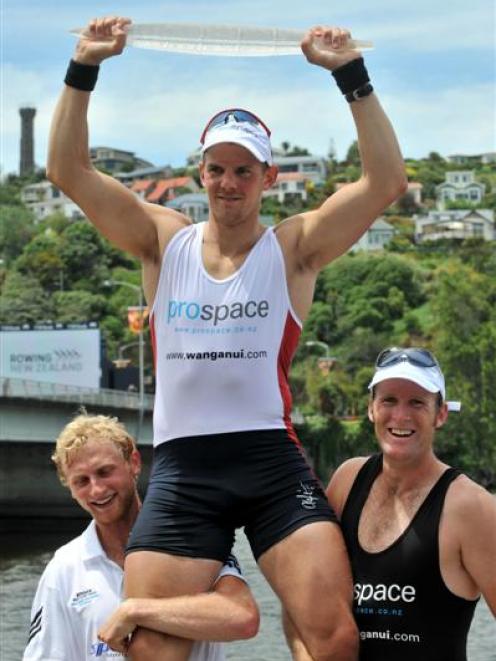 Olympic Champion Olaf Tufte, centre, is held aloft by New Zealanders Hamish Bond (left) and Mahe...