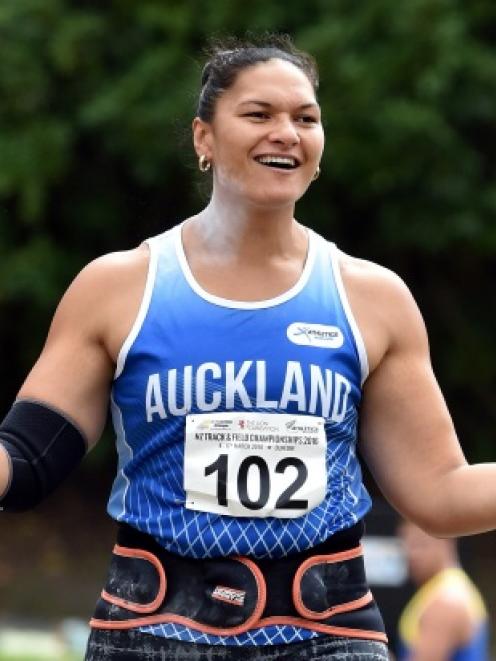 On top of the world ... Double Olympic shot put gold medallist Valerie Adams reacts after...