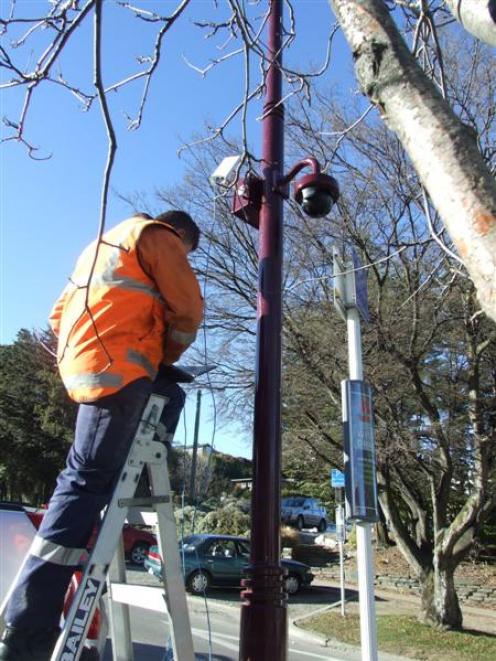One of Queenstown's new CCTV cameras being installed last month. Photo by Christina McDonald.