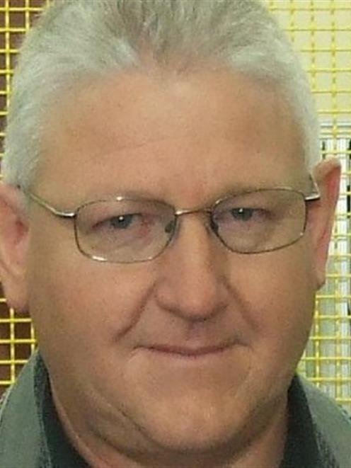 One of the buckled trusses along the collapsed roof of Tuapeka Gold Print's mostly empty...