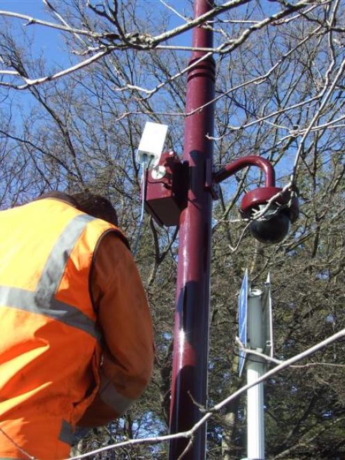 One of the CCTV cameras being installed in Queenstown yesterday. Photo by Christina McDonald.