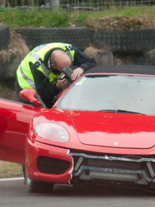 One person is dead after the Ferrari they were driving crashed at Taupo Motorsport Park this...