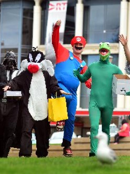 Onlookers  watch (from left) Lindsay Edwards, Kez Wallis, Andrew Wilson, Cory Richards, Chrystall...