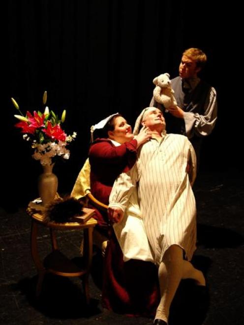 Opera Otago singers (from left) Claire Barton, Andreas Hirt and Julien van Mallearts in one of...
