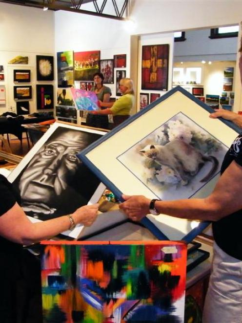 Organising the Queenstown Art Society's Mad March art sale are (left) Cloakroom Gallery manager...