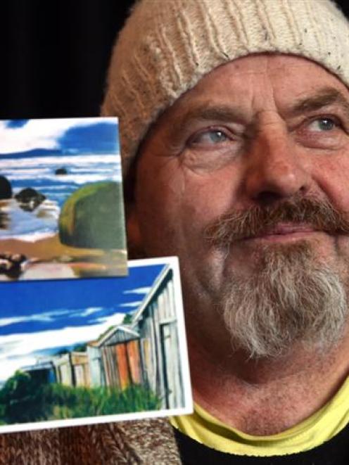 Orion Das with prints of two of the paintings that were in his van when it was stolen from St...