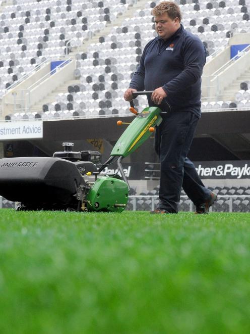 Forsyth Barr Stadium groundsman Brendan Eathorne completes another 8km walk while mowing the...
