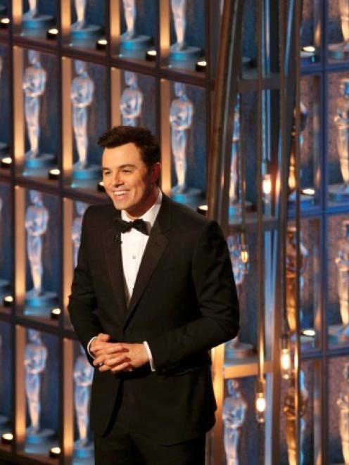Oscar host Seth MacFarlane speaks on stage at the 85th Academy Awards in Hollywood, California....