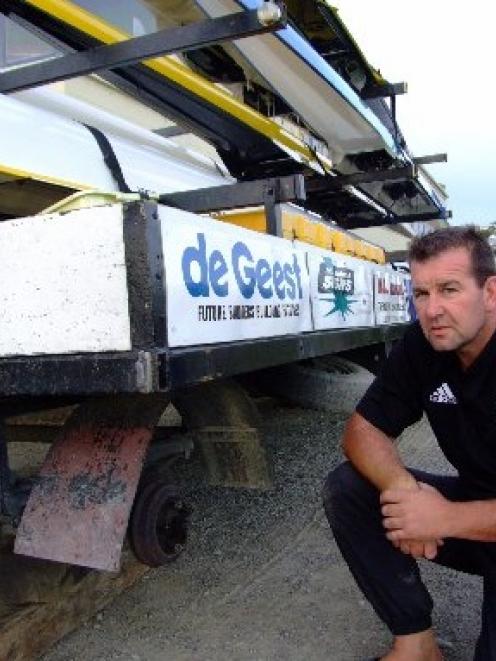 Club captain Donald Taylor waits for the tyres on a trailer to be replaced at the Oamaru Rowing...