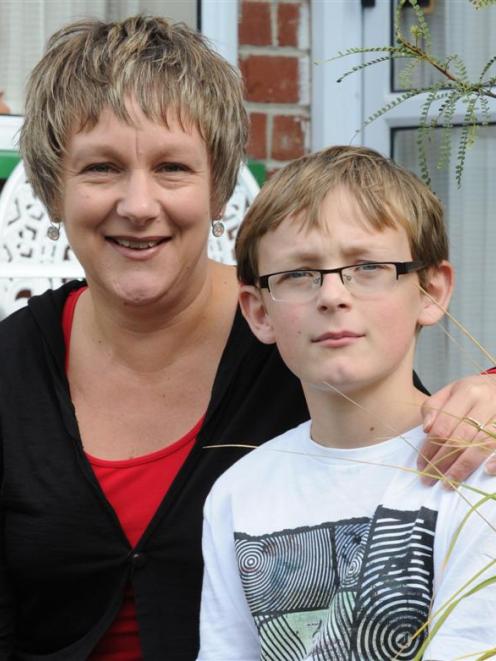 Otago Autism Support founder Nicola Herbert and her son Ryan (11) following a donation of $20,000...