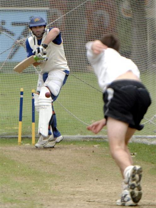 Otago batsman Leighton Morgan defends a delivery from James Fuller during a training session at...