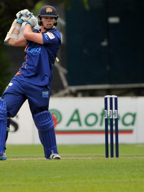 Otago batsman Michael Bracewell plays through the offside during his inninngs of 60 runs off 49...