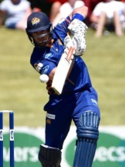 Otago batsman Neil Broom plays through the offside on his way to his century. Photo by Gregor...