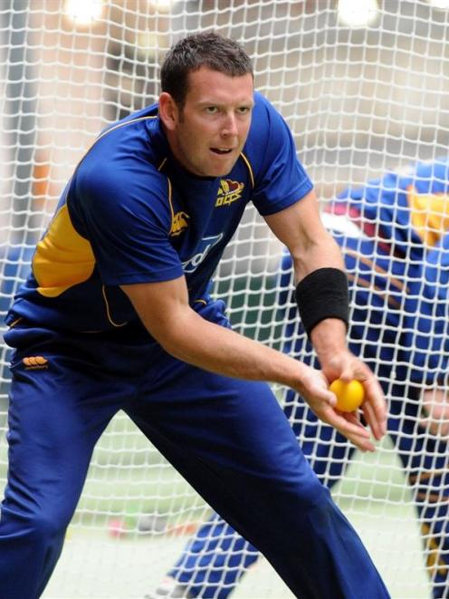 Otago bowler Ian Butler gets in some fielding practice at the Edgar Centre yesterday. Butler...