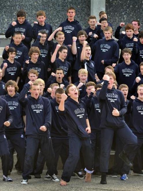 Otago Boys' High School pupils perform a haka before departing yesterday on a three-week Europe...