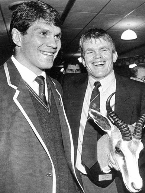 Otago captain David Latta (right) accepts the springbok head from South Africa captain Tiaan...