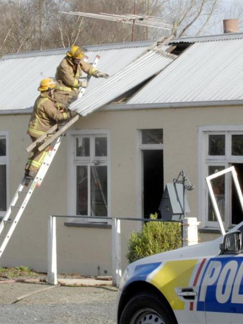 Otago Corrections Facility officer Ash Prasad (left) and Constable Chris Wakelin, of Balclutha,...