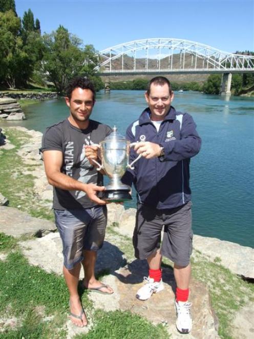 Otago Country captain Brendan Domigan (left) and coach Andy Sainsbury proudly hold the Hawke Cup...