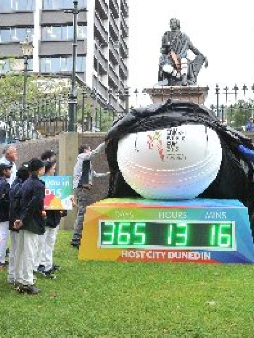 Otago Cricket marketing manager Andy McLean (left) and Black Cap Nathan McCullum unveil the...