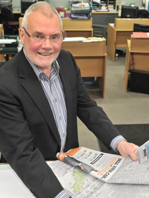 Otago Daily Times classified advertising manager Ken Dowdall looks at one of the last classified...
