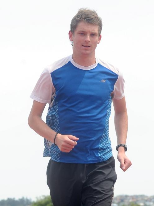 Otago distance runner Caden Shields trains at the Caledonian Ground. Photo by Craig Baxter.