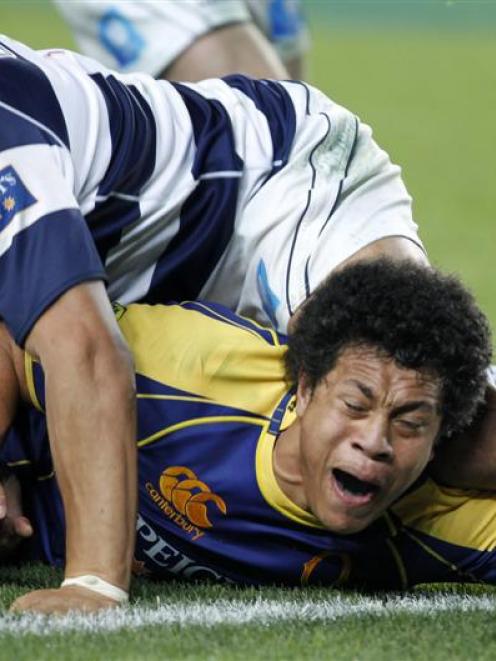 Otago flanker TJ Ioane reaches out to score during the ITM Cup match against Auckland last night.
