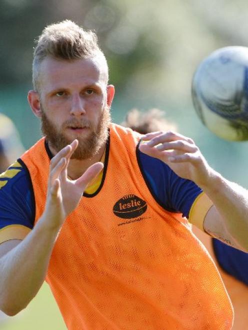 Otago forward Josh Dickson eyes the ball at training at Logan Park this week. PHOTO: GERARD O'BRIEN